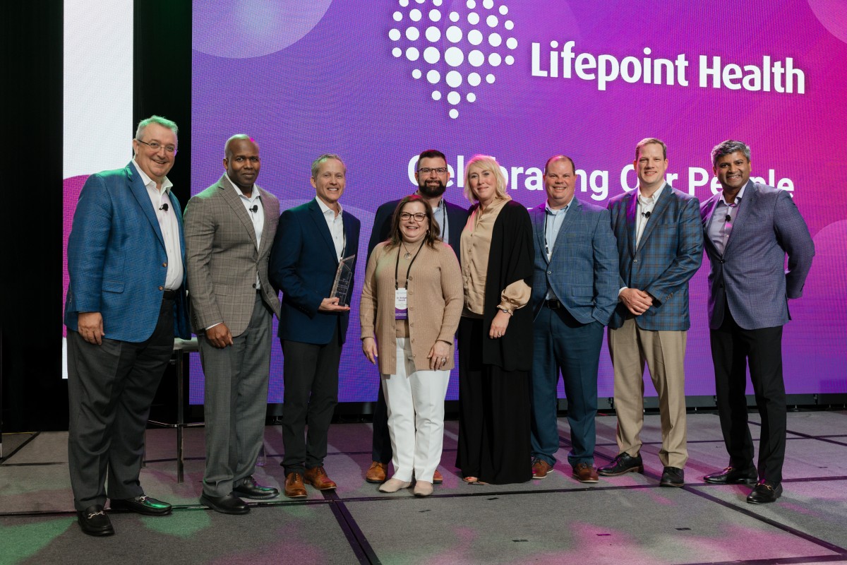 Frye Regional executive team onstage accepting the Lifepoint Health Growth Award for 2023